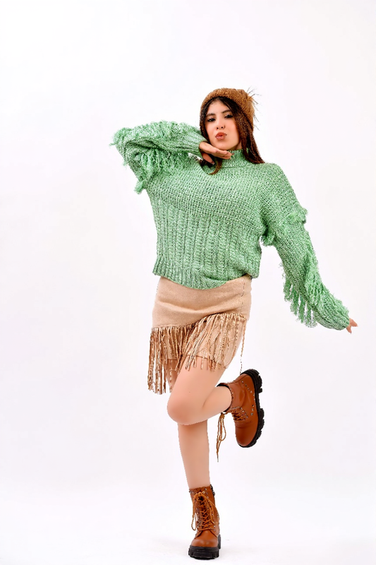 fringe detailing along the sleeves and sides sweater