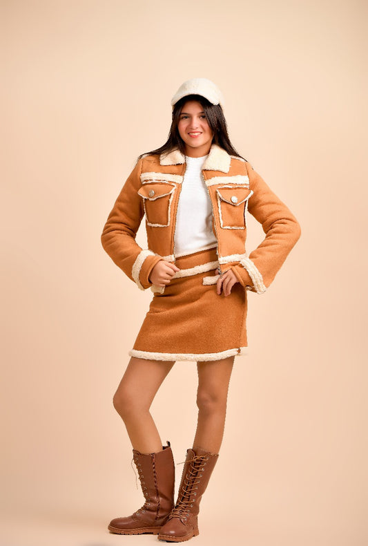 jacket paired with a matching mini skirt