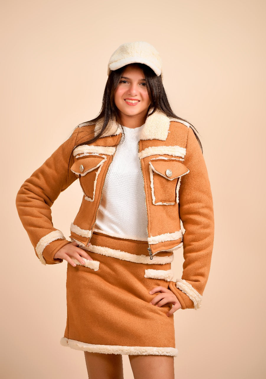 jacket paired with a matching mini skirt