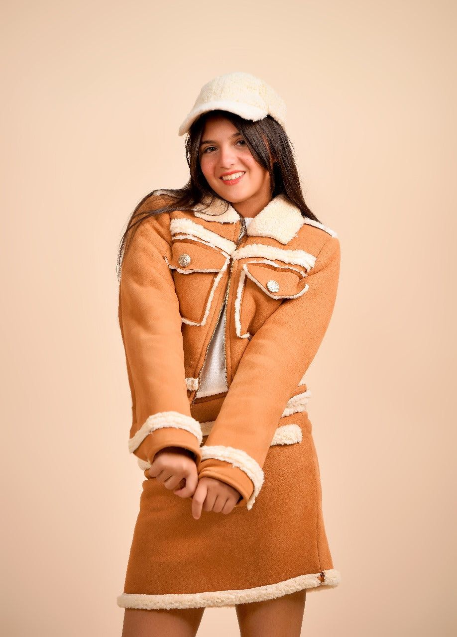 jacket paired with a matching mini skirt